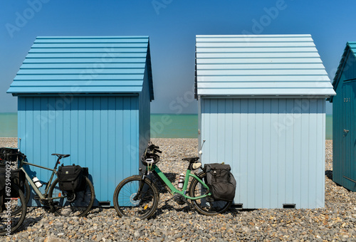 Slika na platnu Blue wooden houses and bikes on the ocean Dieppe