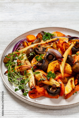 baked winter veggies and mushrooms on a plate