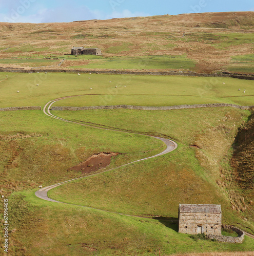 The road over Buttertubs Pass in the Yorkshire Dales during autumn. photo