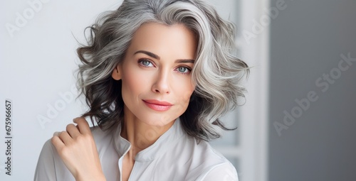 Natural Beauty and Cosmetic Beauty Products Concept. Woman with Gray Hair.