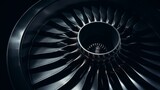 Explore the cutting-edge technology of a modern turbofan engine with this close-up shot of the turbojet on a black background. Marvel at the intricacy of the blades within the turbofan