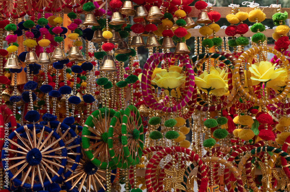 Fototapeta premium Mumbai , India - 9 November 2023, Home decoration items souvenir for sale during diwali festival time at malad west Mumbai India