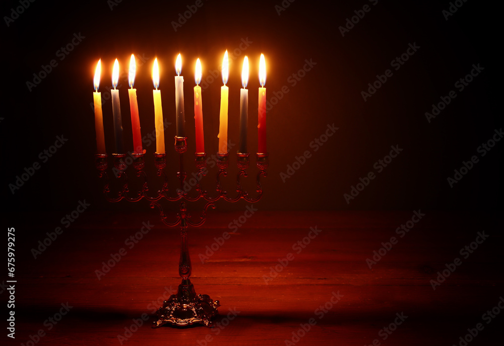 Religion image of jewish holiday Hanukkah background with menorah (traditional candelabra) and candles Religion image of jewish holiday Hanukkah background with menorah (traditional candelabra) and candles