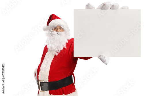 Santa claus holding a small blank cardboard © Ljupco Smokovski