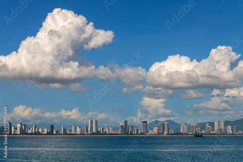 View of the sea bay and the Vietnamese city of Nha Trang on a sunny cloudy day