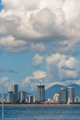 View of the sea bay and the Vietnamese city of Nha Trang on a sunny cloudy day