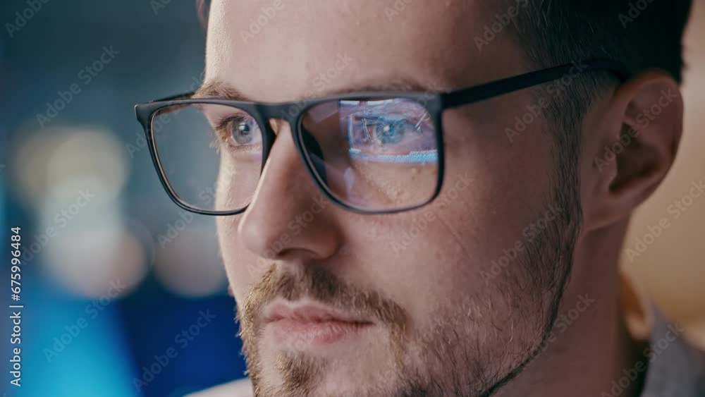 Reflection in eyeglasses. War crime in Ukraine during russian troops attack civilians. Man watching how ukrainian patriots volunteers helping their army to stop aggression Reflection in eyeglasses. War crime in Ukraine during russian troops attack civilians. Man watching how ukrainian patriots volunteers helping their army to stop aggression