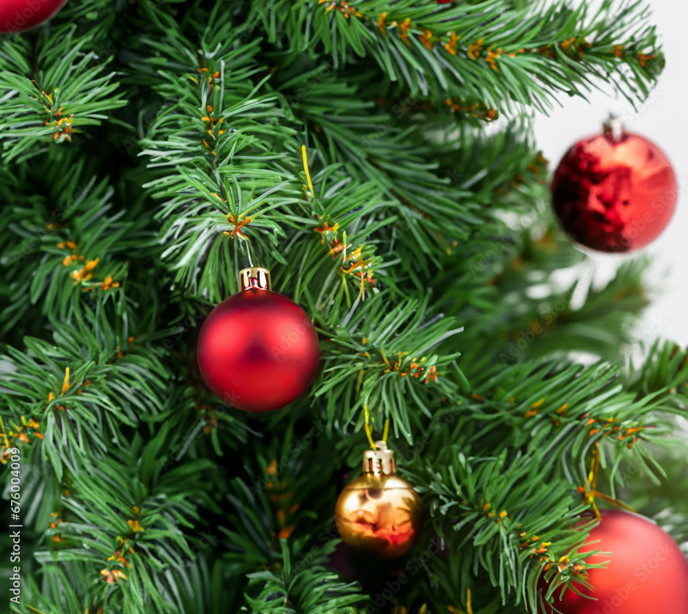Close-up of red and gold balls on a Christmas tree, christmas decorations Close-up of red and gold balls on a Christmas tree, christmas decorations
