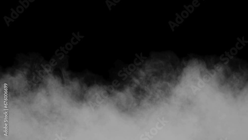  Horizontally and vertically moving the white smoke. movinng clouds in slow speed on black background. 
