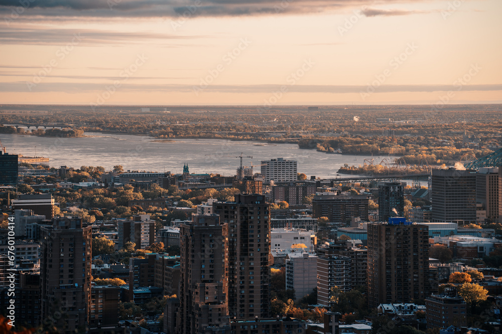 Panoramic view of the Skyscrapers of Montreal at sunrise from Mont Royal, Business centre and skyscrapers warm light finance centers banks money view of the San Lorenzo river