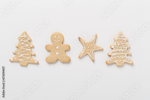 Cute homemade Christmas cookies on color background,top view