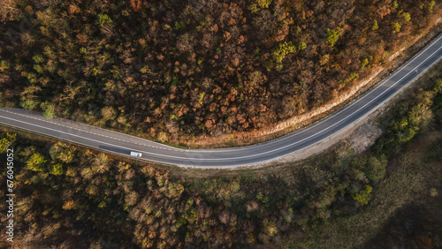 car vehicle drive on Tresibaba mountain range nature aerial view in autumn day near Knjazevac Serbia top down photo