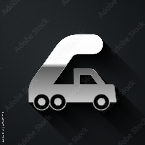 Silver Passenger ladder for plane boarding icon isolated on black background. Airport stair travel. Long shadow style. Vector