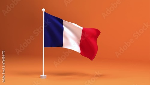 Elegant France Flag on a Stand with a Warm Orange Background. Beautiful France flag on a white flagpole.