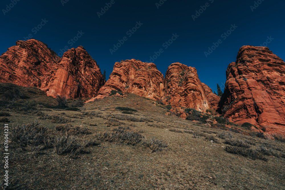 Picturesque landscape with red mountains