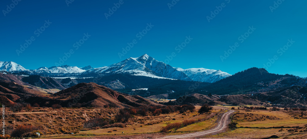 Autumn mountains landscape in Kyrgyzstan, panoramic view