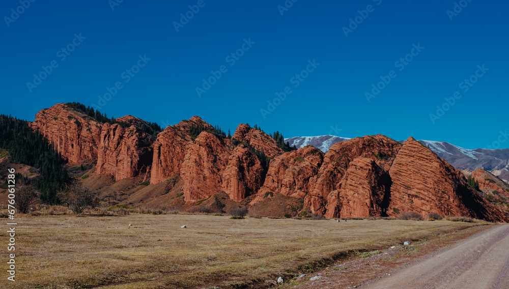 Picturesque landscape with red mountains in autumn