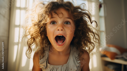 brasilian toddler with a surprised face photo