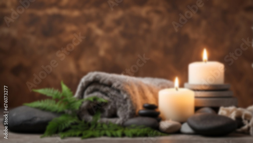 Blur Towel on fern with candles and hot stone on white wooden background. backdrop with copy space