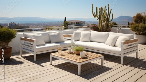 A beautiful terrace setting with a modern furniture set. © visoot
