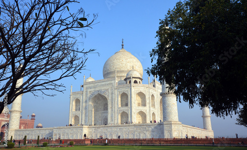 View of the Taj Mahal at sunrise is an ivory-white marble mausoleum on the right bank of the river Yamuna in Agra 