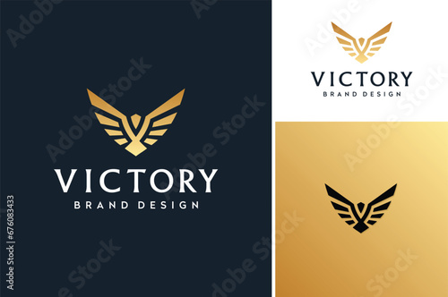 Golden Wingspan Bird, Dove Pigeon Eagle Falcon Osprey Hawk Phoenix Wings Initial Letter V for Victory Gold Luxury Premium Brand Logo Design photo