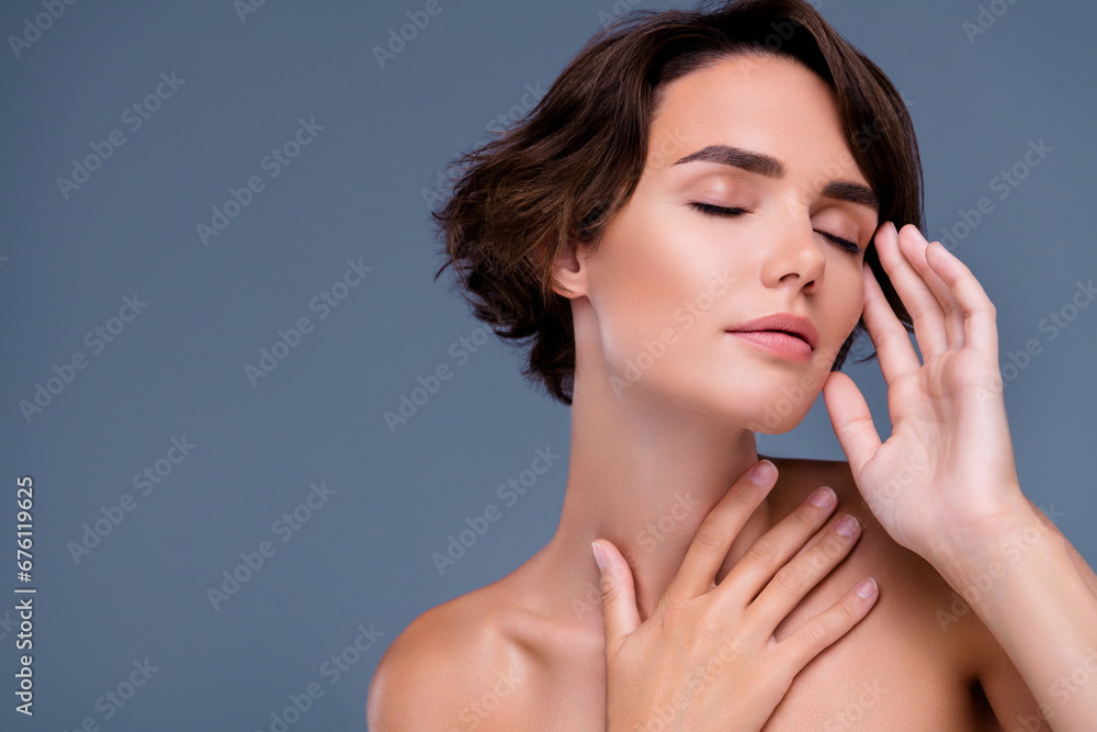 Photo of chic pretty lady applying cream lotion on face touch soft silky skin over grey color background Photo of chic pretty lady applying cream lotion on face touch soft silky skin over grey color background