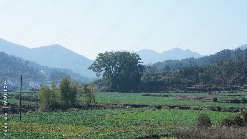 The beautiful countryside view with the old village and mountains on the south of the China