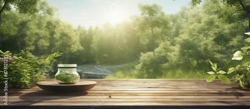 The background image depicts a tranquil scene of nature with a lush green landscape and a serene wooden pathway leading through the trees The air is filled with the healing aroma of natural