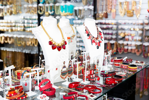 Quadro su tela Collection of stylish bijouterie displayed for sale on shelves of costume jewelr