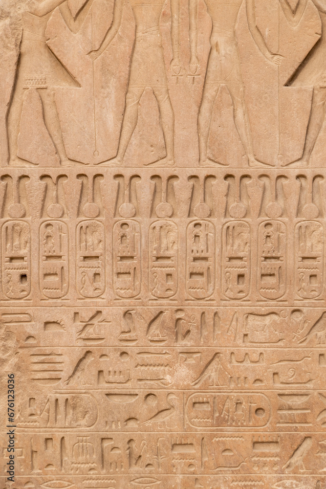 ancient egyptian hieroglyphs on huge wall in Karnak Temple in Luxor Egypt