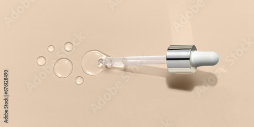 Pipette serum oil sample swatch texture dropper isolated on beige background. cosmetic Hyaluronic acid retinol science lab product