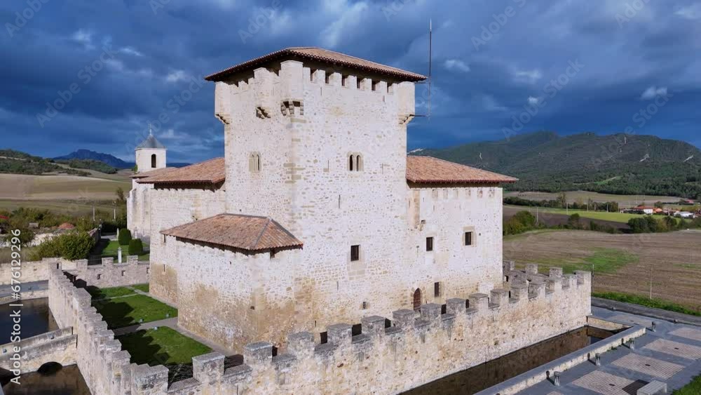 Aerial view from a drone of the Varona Palace Tower in the town of Villañañe. Valdegovia Valley. Alava. Basque Country. Spain. Europe Aerial view from a drone of the Varona Palace Tower in the town of Villañañe. Valdegovia Valley. Alava. Basque Country. Spain. Europe