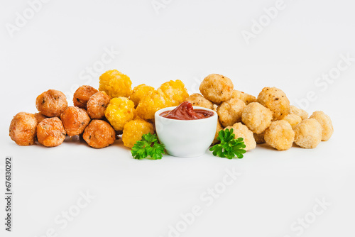 Assorted Breaded Chicken Inner Fillet,Chicken Breaded Raw Meat.Fast cooking.Breaded Chicken nuggets Fillet with salad on a White Background,food at home.Fast homemade food.Chicken breaded .