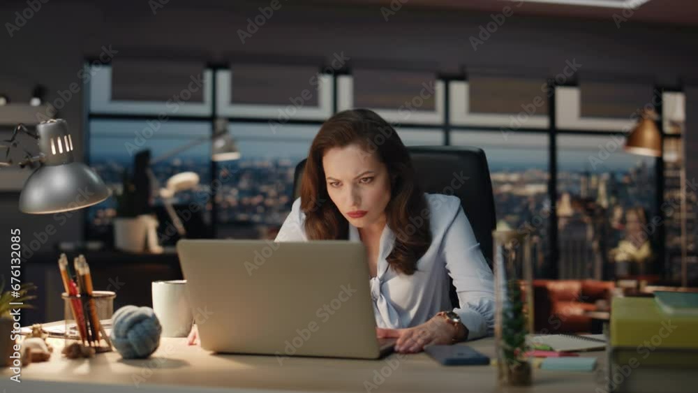 Woman workaholic staying late dark office closeup. Tired businesswoman working Woman workaholic staying late dark office closeup. Tired businesswoman working