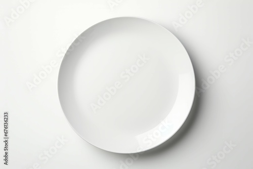 White plate placed on a white background photo