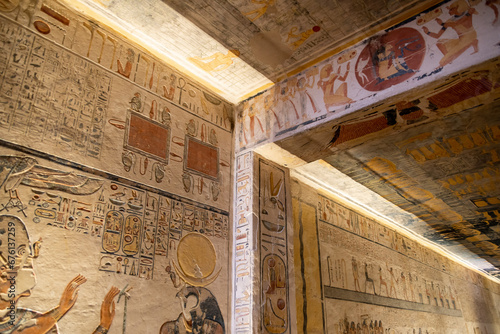 colorful hieroglyphs in ancient egyptian tomb in the valley of the kings in luxor, egypt photo
