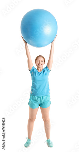 Beautiful young woman in sportswear exercising with fitness ball on white background © Pixel-Shot