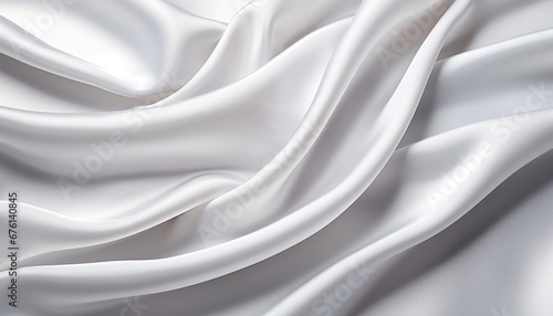 Closeup of elegant white silk fabric cloth background with slight crumpling luxury texture design