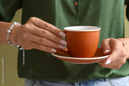 Woman's hands holding a war...