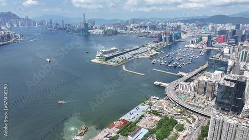 Drone Aerial Skyview of Royal Caribbean Spectrum of the seas Mega Luxury Cruise Ship dock anchor in Commercial construction development project in Kai Tak Sports Park Cruise Terminal in Kwun Tong Kowl photo