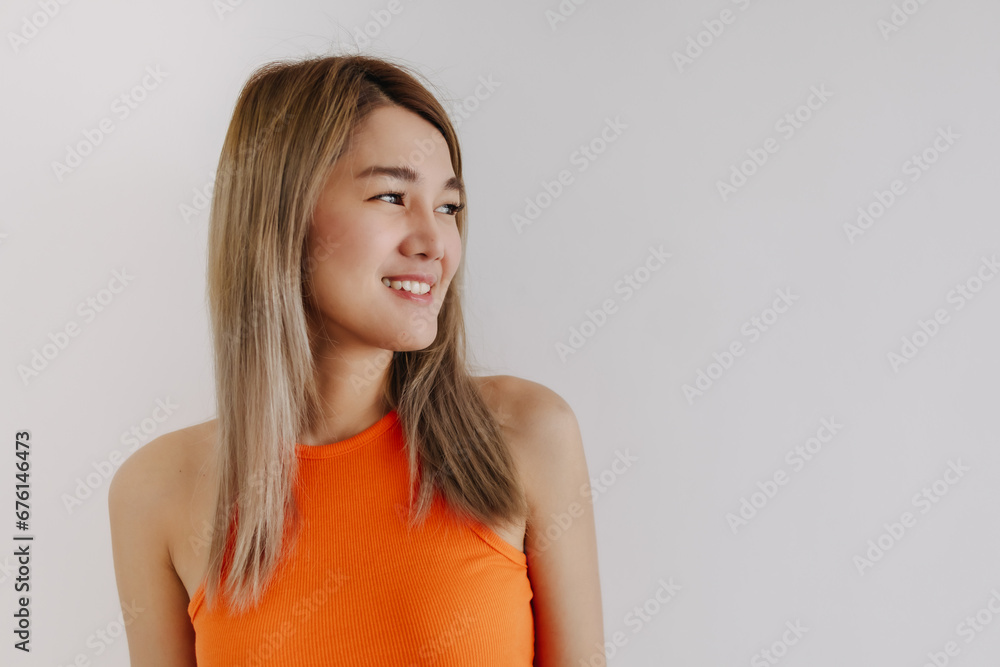 Smile and happy asian woman in colorful dress in orange lemon isolated on white. Smile and happy asian woman in colorful dress in orange lemon isolated on white.