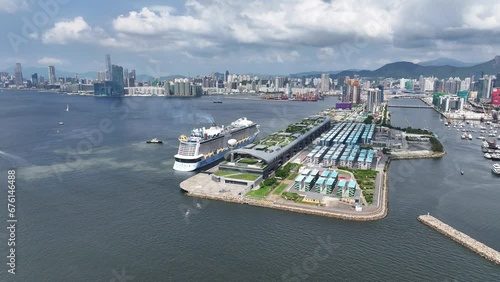 Drone Aerial Skyview of Royal Caribbean Spectrum of the seas Mega Luxury Cruise Ship dock anchor in Commercial construction development project in Kai Tak Sports Park Cruise Terminal in Kwun Tong Kowl photo