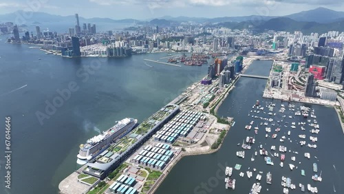 Drone Aerial Skyview of Royal Caribbean Spectrum of the seas Mega Luxury Cruise Ship dock anchor in Commercial construction development project in Kai Tak Sports Park Cruise Terminal in Kwun Tong Kowl photo