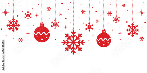 Festive decoration of snowflakes and red christmas ornaments. photo