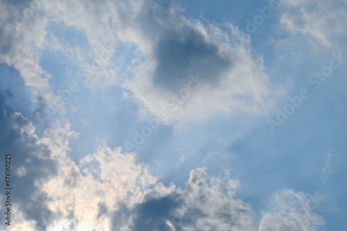 beautiful blue sky and cloud with golden ray sunrise in the morning, natural background