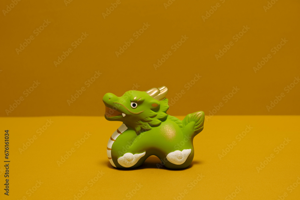 Japanese new year material. Zodiac dragon on golden background. 日本のお正月素材。金色背景上の干支の辰。 Japanese new year material. Zodiac dragon on golden background. 日本のお正月素材。金色背景上の干支の辰。