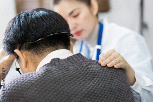 Hands of medical personnel comforting to reassure the patient in clinic, Healthcare and medical concept