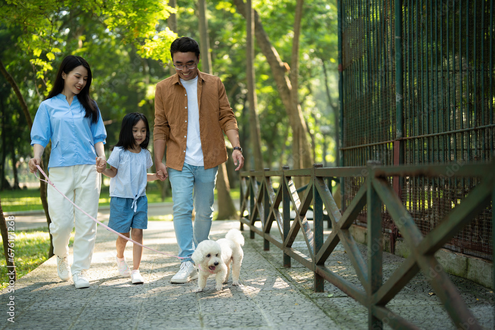 Photo of young Asian family at park Photo of young Asian family at park