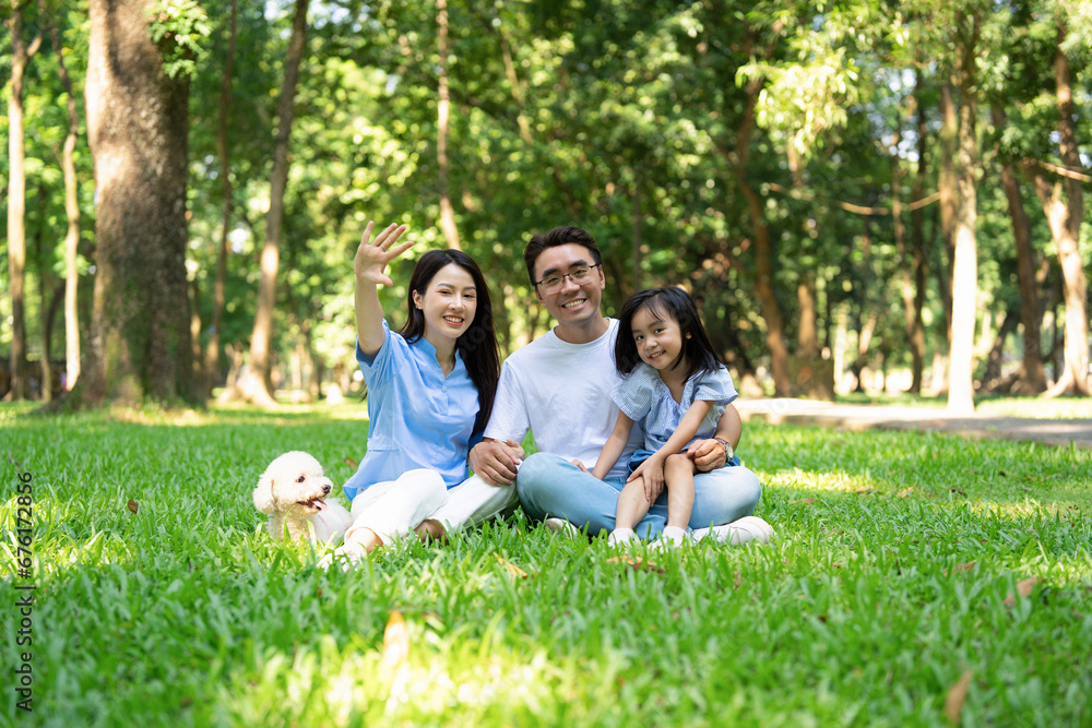 Photo of young Asian family at park Photo of young Asian family at park